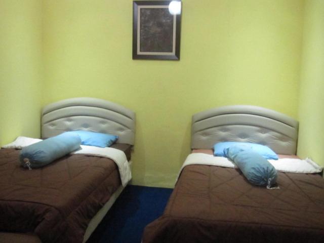 Syariah Hotel Джакарта Стая снимка